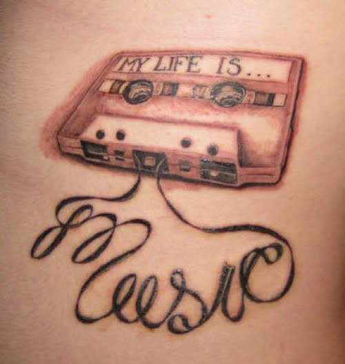 tattoo saying 'my life is... music'
